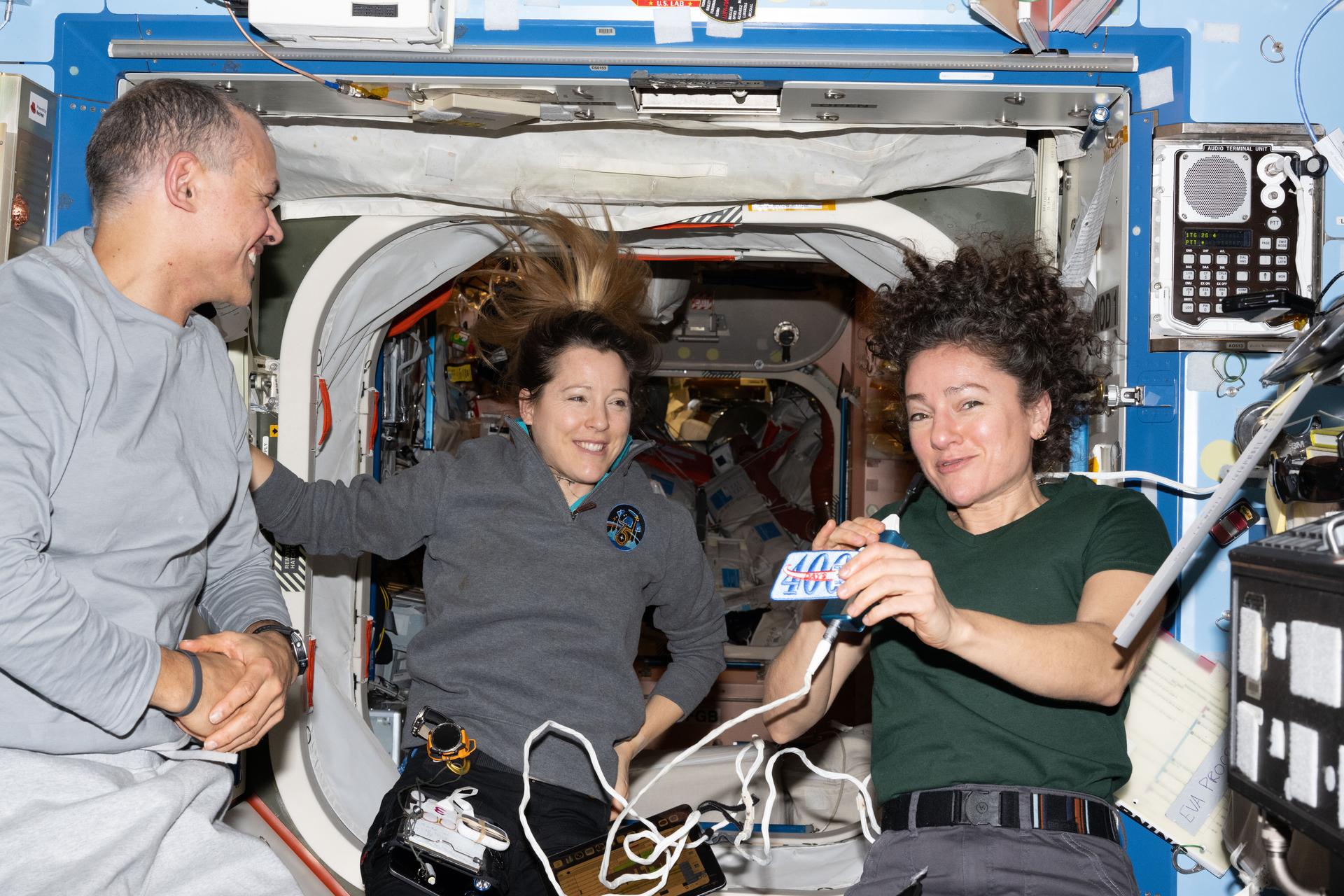 Crew Studies Medicine and Physics, Works on Spacesuits and Earth Photo Gear